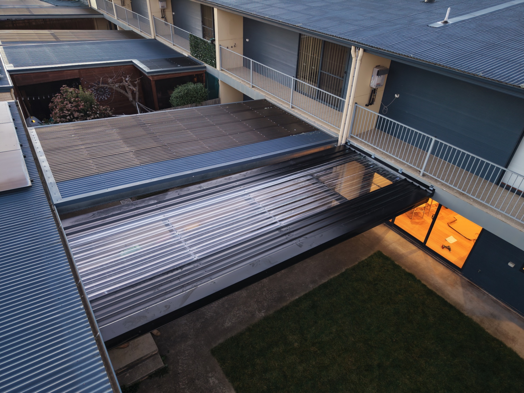 Multi-Level Patio Roof with Transparent Panels